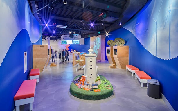 Interiors of This is Holland with lighthouse model and interactive displays.