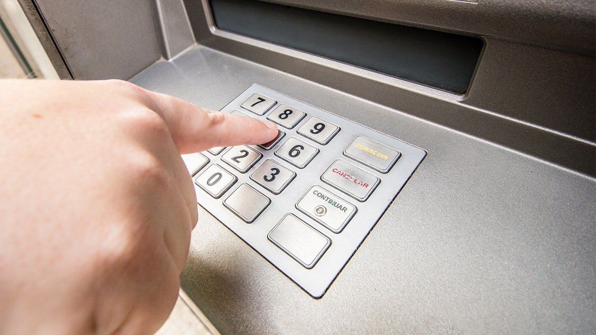 Visitor using an ATM keypad, one of the convenient facilities available for tourists at the Uffizi Gallery