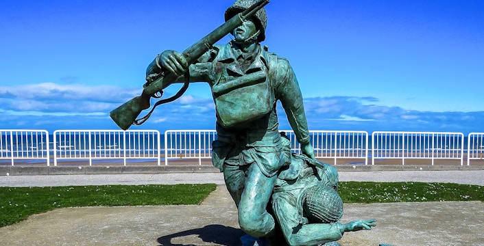 Statue of soldiers at Normandy Beach, France, commemorating D-Day.