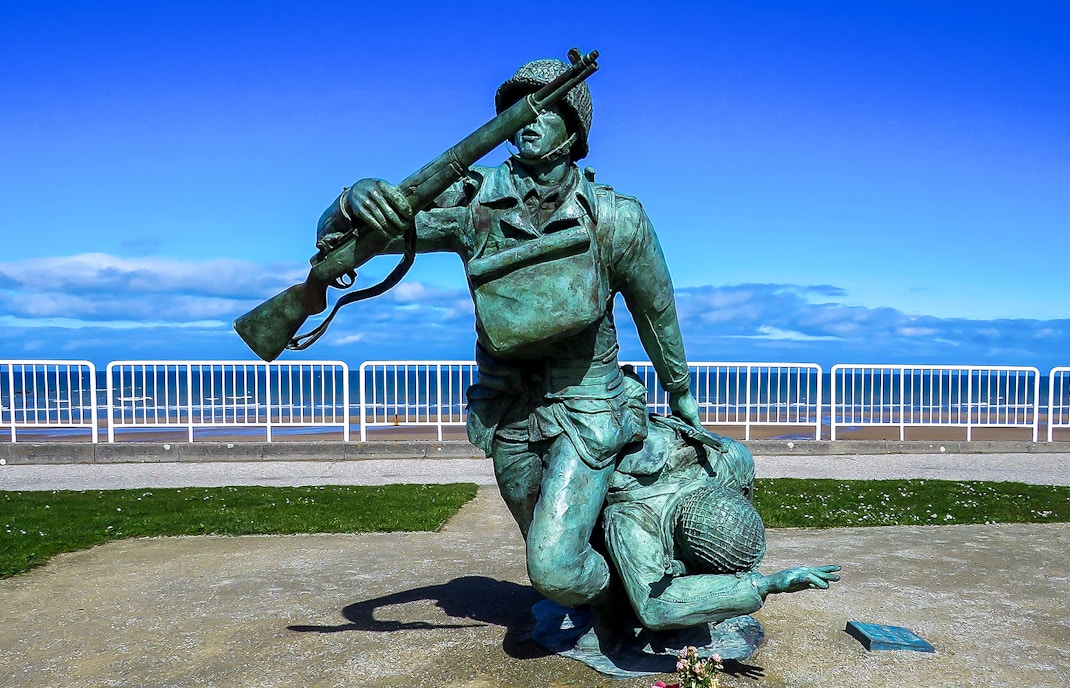 Statue of soldiers at Normandy Beach, France, commemorating D-Day.