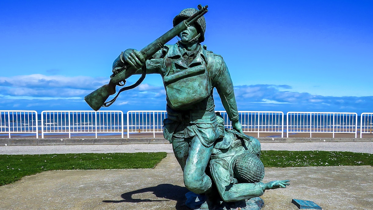 Statue of soldiers at Normandy Beach, France, commemorating D-Day.
