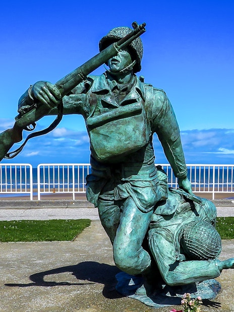 Statue of soldiers at Normandy Beach, France, commemorating D-Day.