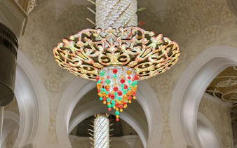 Chandelier inside Sheikh Zayed Grand Mosque during Abu Dhabi night city tour.