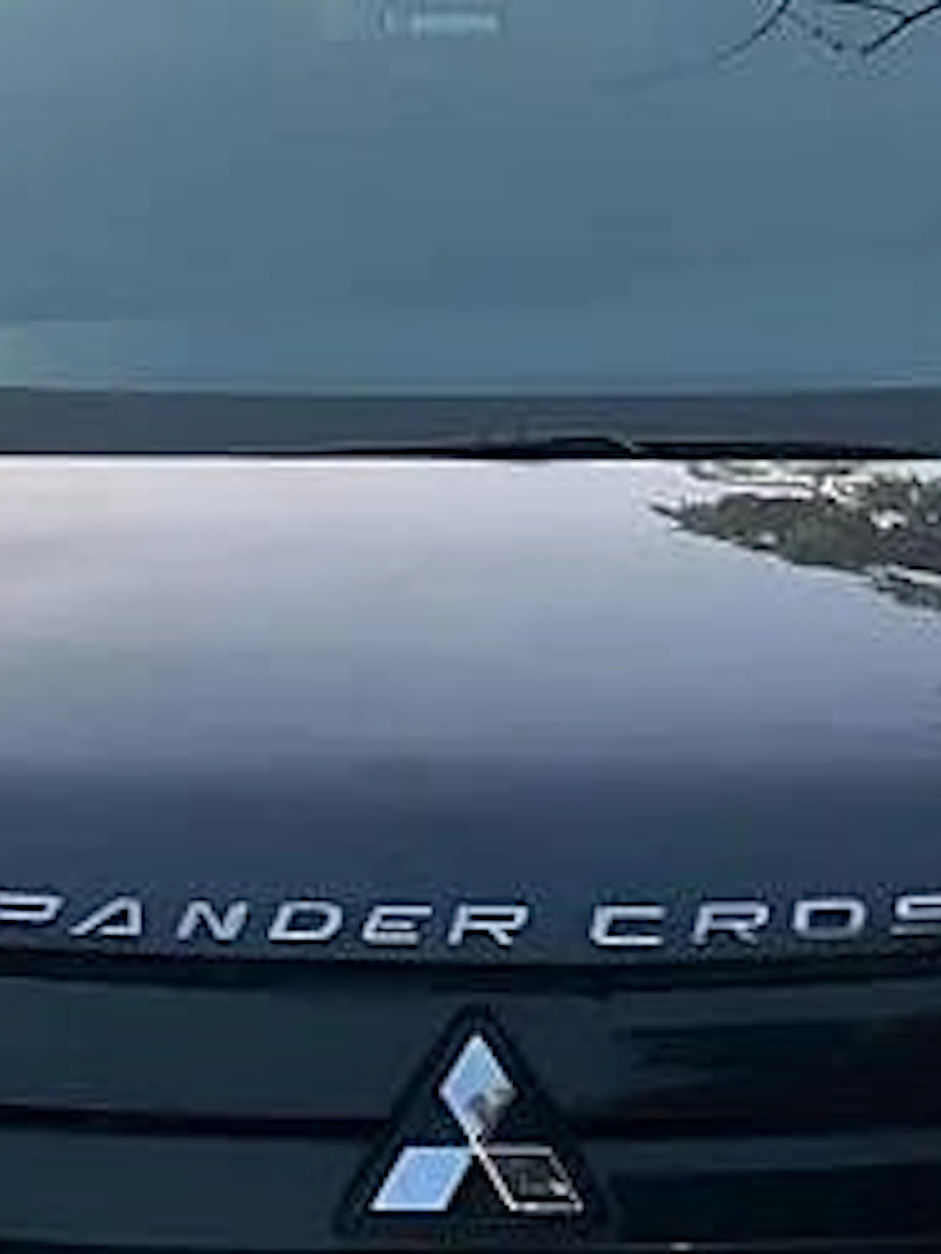 Front view of a Mitsubishi Xpander Cross used for Hurghada airport to hotel transfer service.