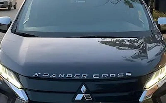 Front view of a Mitsubishi Xpander Cross used for Hurghada airport to hotel transfer service.
