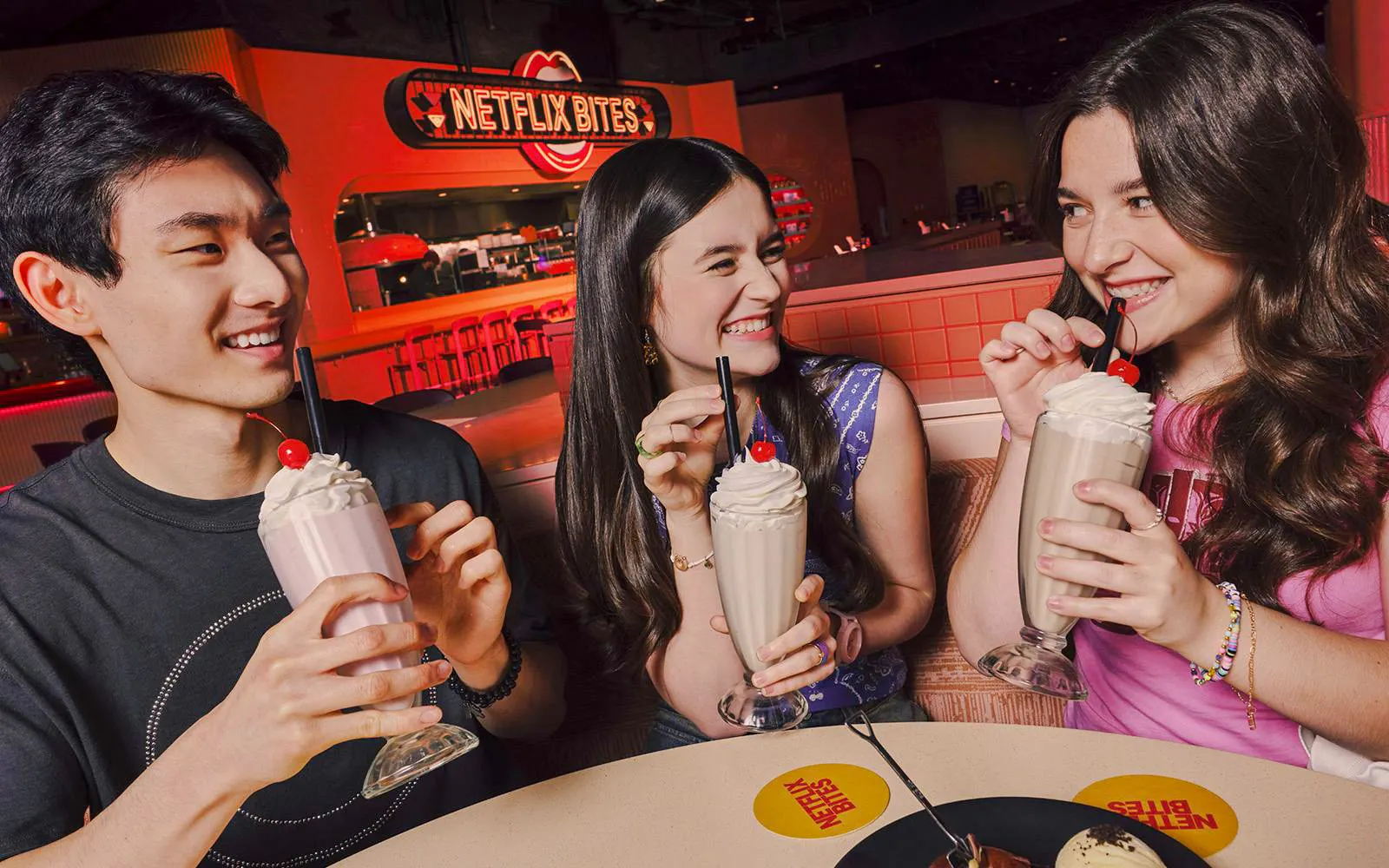 Guests enjoying milkshakes at Netflix House Philadelphia.