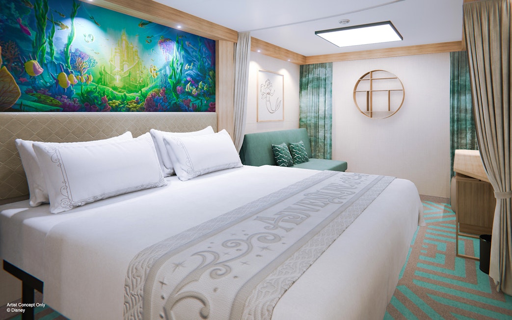 Deluxe Inside Stateroom with ocean-themed decor on Disney Adventure Cruise.