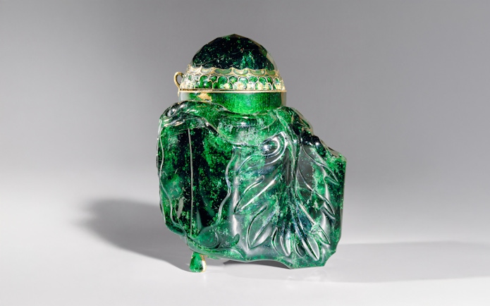 Emerald vessel with intricate carvings at Imperial Treasury Vienna.