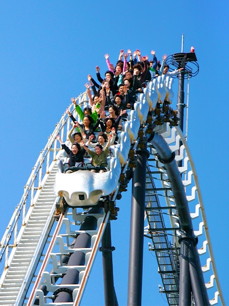 Visitors riding a rollercoaster at Fuji-Q Highland, Japan.