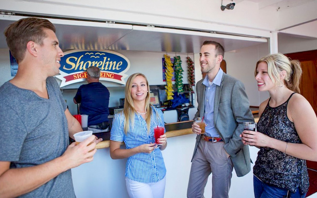 Guests enjoying drinks on Lake Michigan Skyline Cruise.