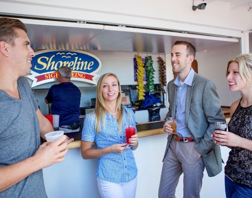 Guests enjoying drinks on Lake Michigan Skyline Cruise.