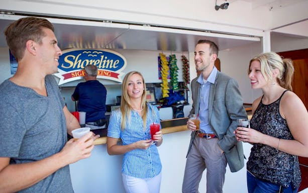 Guests enjoying drinks on Lake Michigan Skyline Cruise.