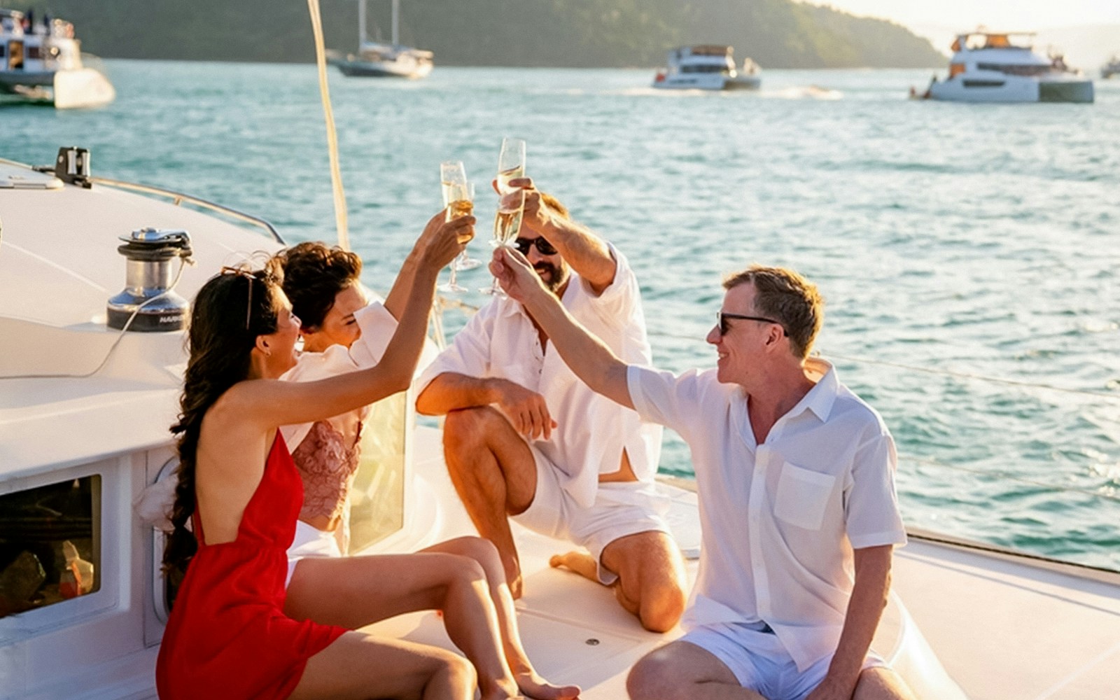 Guests toasting with drinks on a boat tour to Blue Caves.