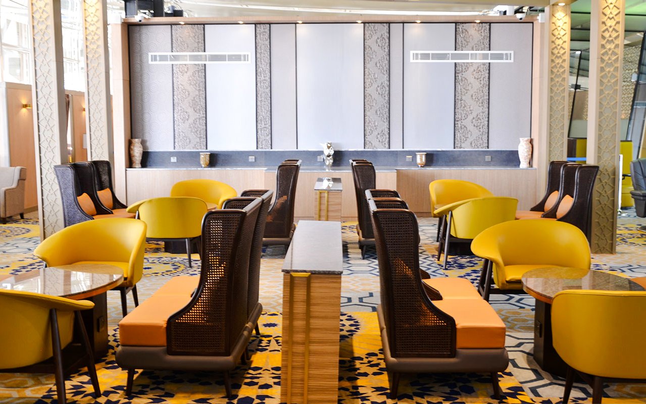 Seating area in Plaza Premium Lounge at King Abdulaziz International Airport.