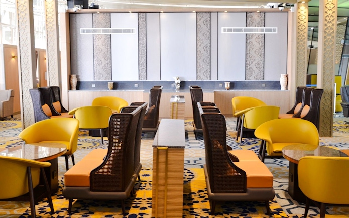 Seating area in Plaza Premium Lounge at King Abdulaziz International Airport.