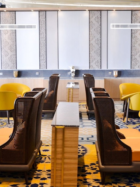 Seating area in Plaza Premium Lounge at King Abdulaziz International Airport.