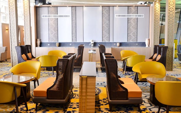 Seating area in Plaza Premium Lounge at King Abdulaziz International Airport.