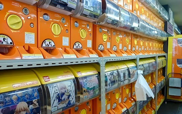 Gachapon machines in Akihabara, Tokyo, during a guided walking tour.