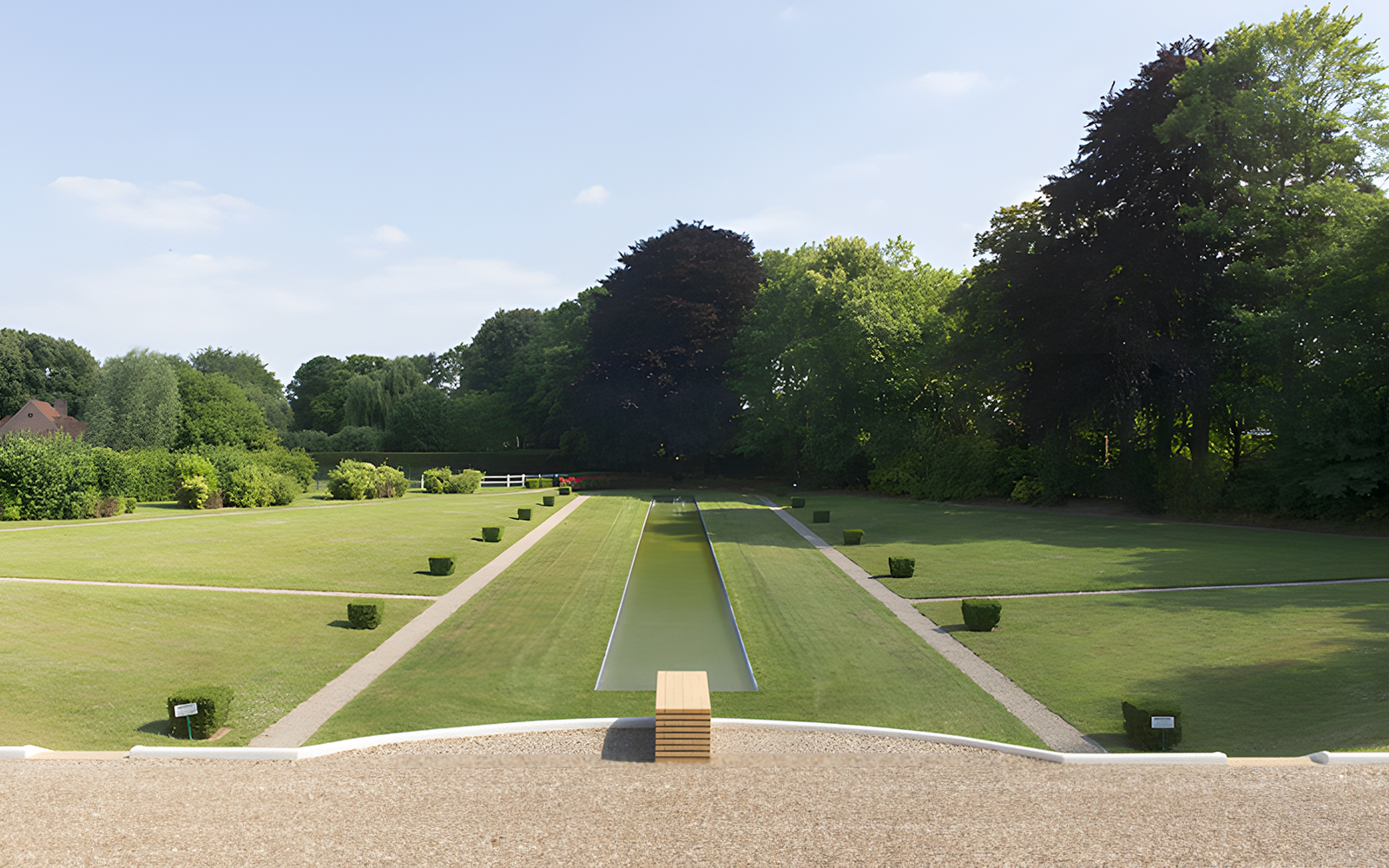 Villa Cavrois garden with central reflecting pool and manicured lawns in Croix, France.
