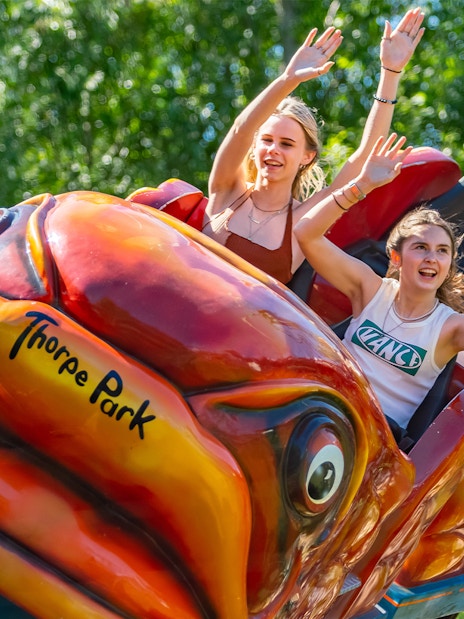 Riders enjoying the Flying Fish ride at Thorpe Park.