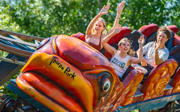 Riders enjoying the Flying Fish ride at Thorpe Park.