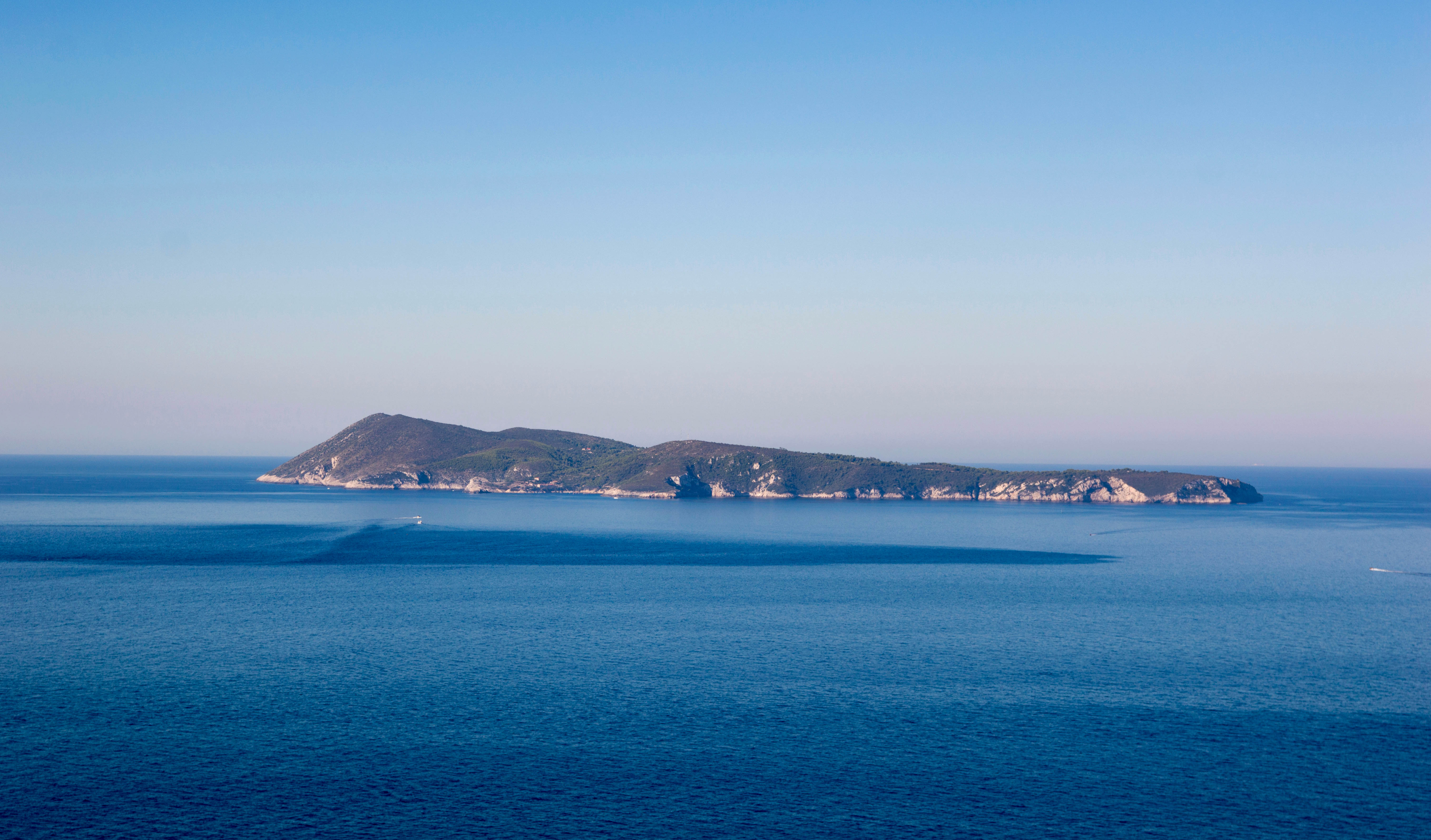 Bisevo Island surrounded by the Adriatic Sea, viewed from a distance.