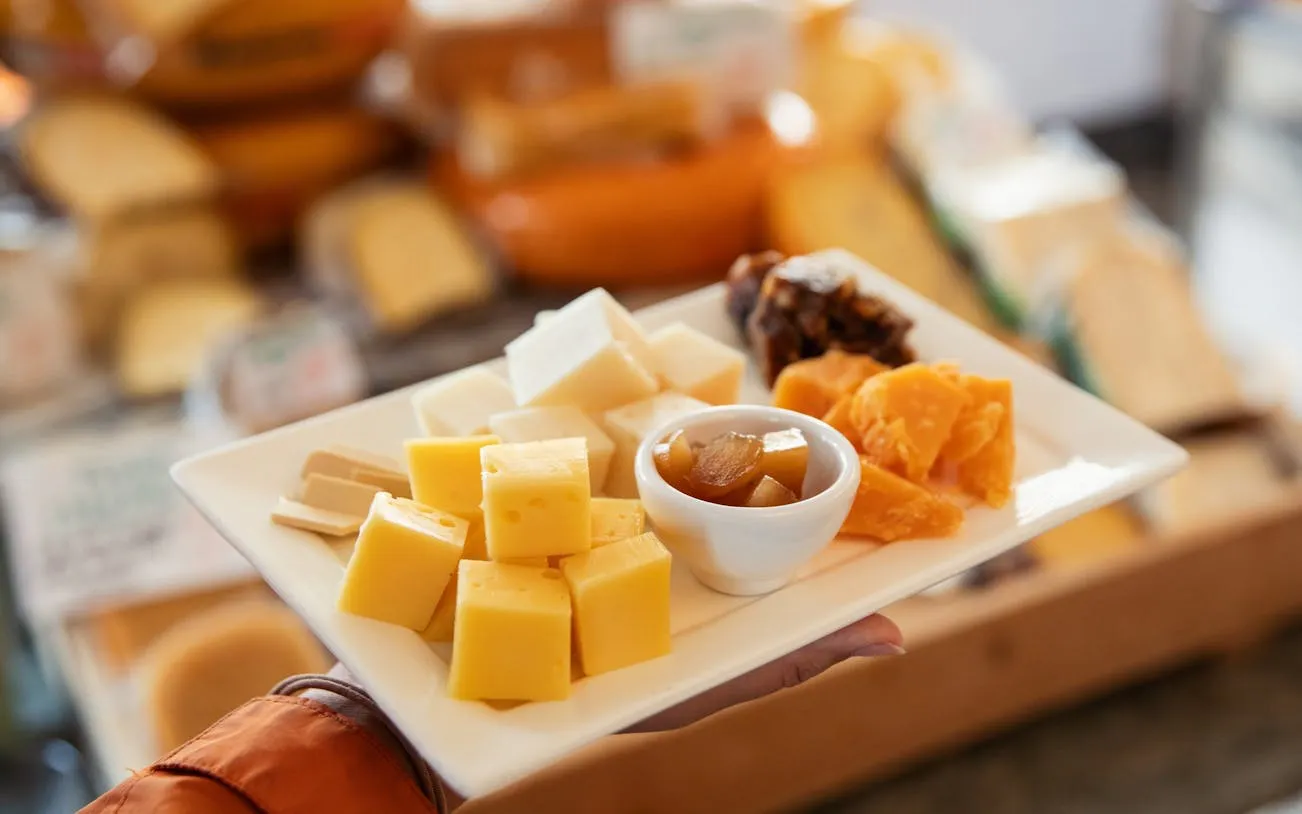 Cheese platter with assorted cheeses and chutney on Jordaan Food Tour.