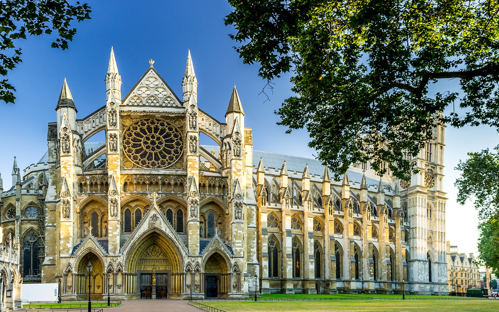 Westminster Abbey facade with intricate Gothic architecture in London.