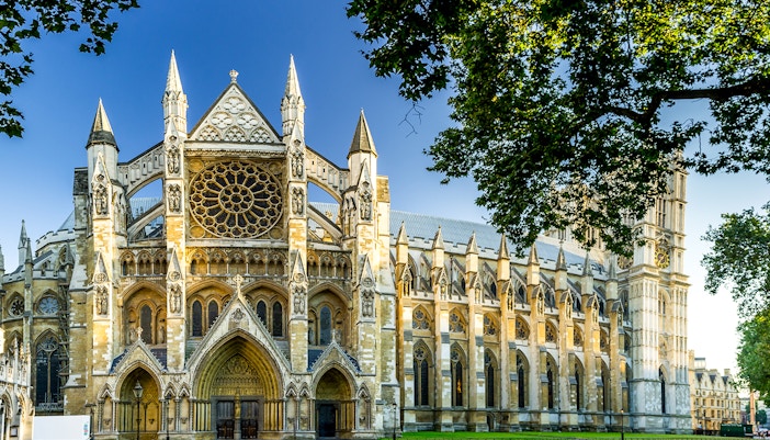 Westminster Abbey facade with intricate Gothic architecture in London.