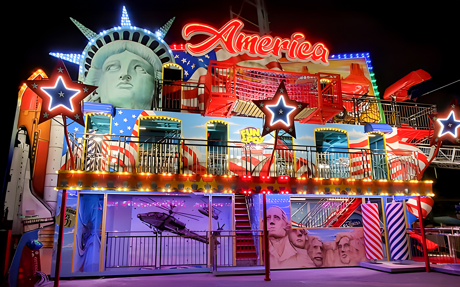 Fun Spot America Theme Park facade with Statue of Liberty and Mount Rushmore elements.