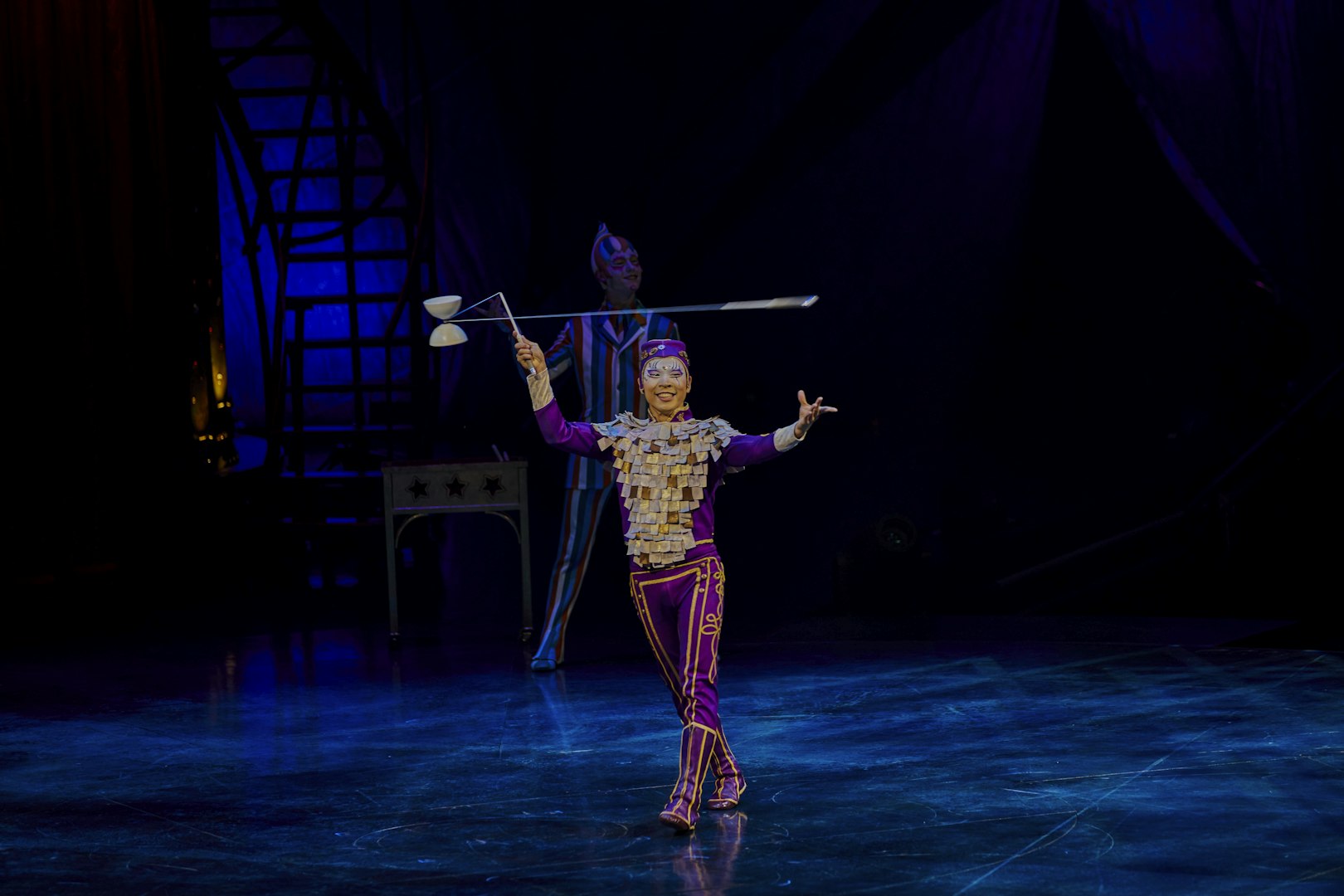 Performer juggling diabolo on stage during Kooza show in Brisbane.