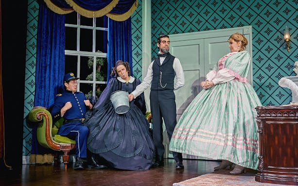 Stage scene from "Oh, Mary" Westend show with actors in period costumes.