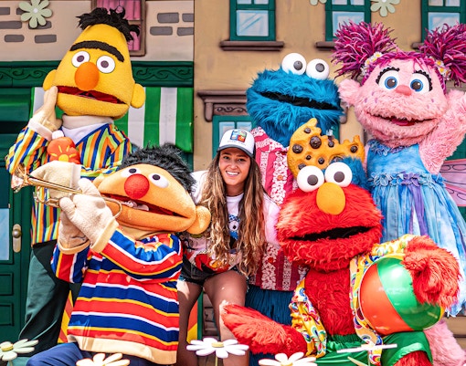 People dressed up as Bert, Ernie and their friends