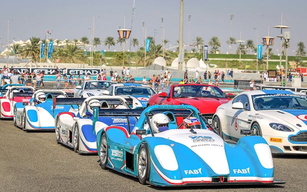 Race cars lined up for the YAS Radical SST Passenger experience at Yas Marina Circuit.
