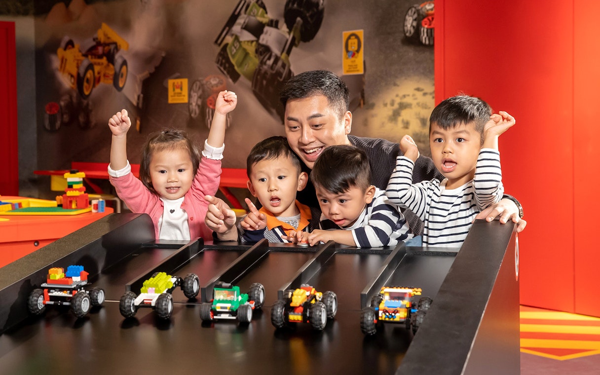 Children racing LEGO cars at LEGOLAND® Discovery Centre Hong Kong.