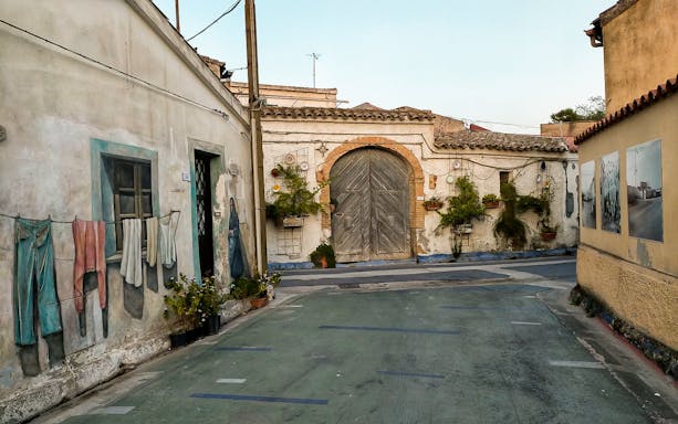 San Sperate mural art on a guided city tour from Cagliari, Italy.