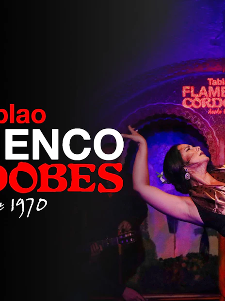 Flamenco dancers performing at Tablao Cordobes in vibrant traditional attire.