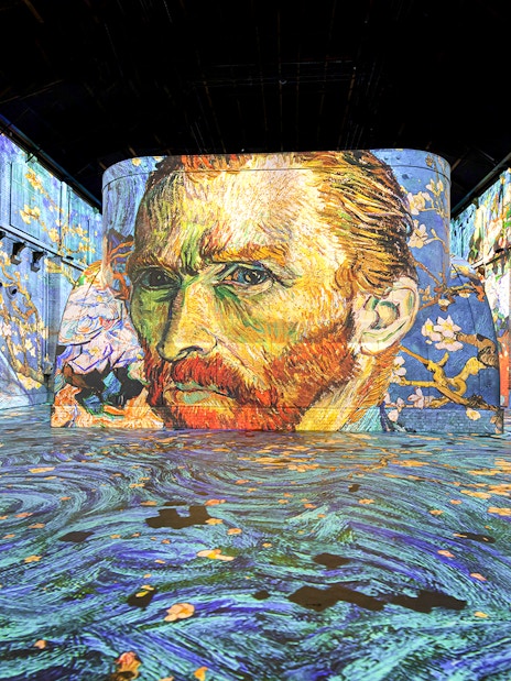 Van Gogh's self-portrait projected in Fabrique des Lumières exhibition hall.