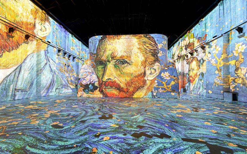 Van Gogh's self-portrait projected in Fabrique des Lumières exhibition hall.
