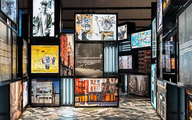 Exhibit of Jean-Michel Basquiat's artwork in Behind the Canvas Series 1.