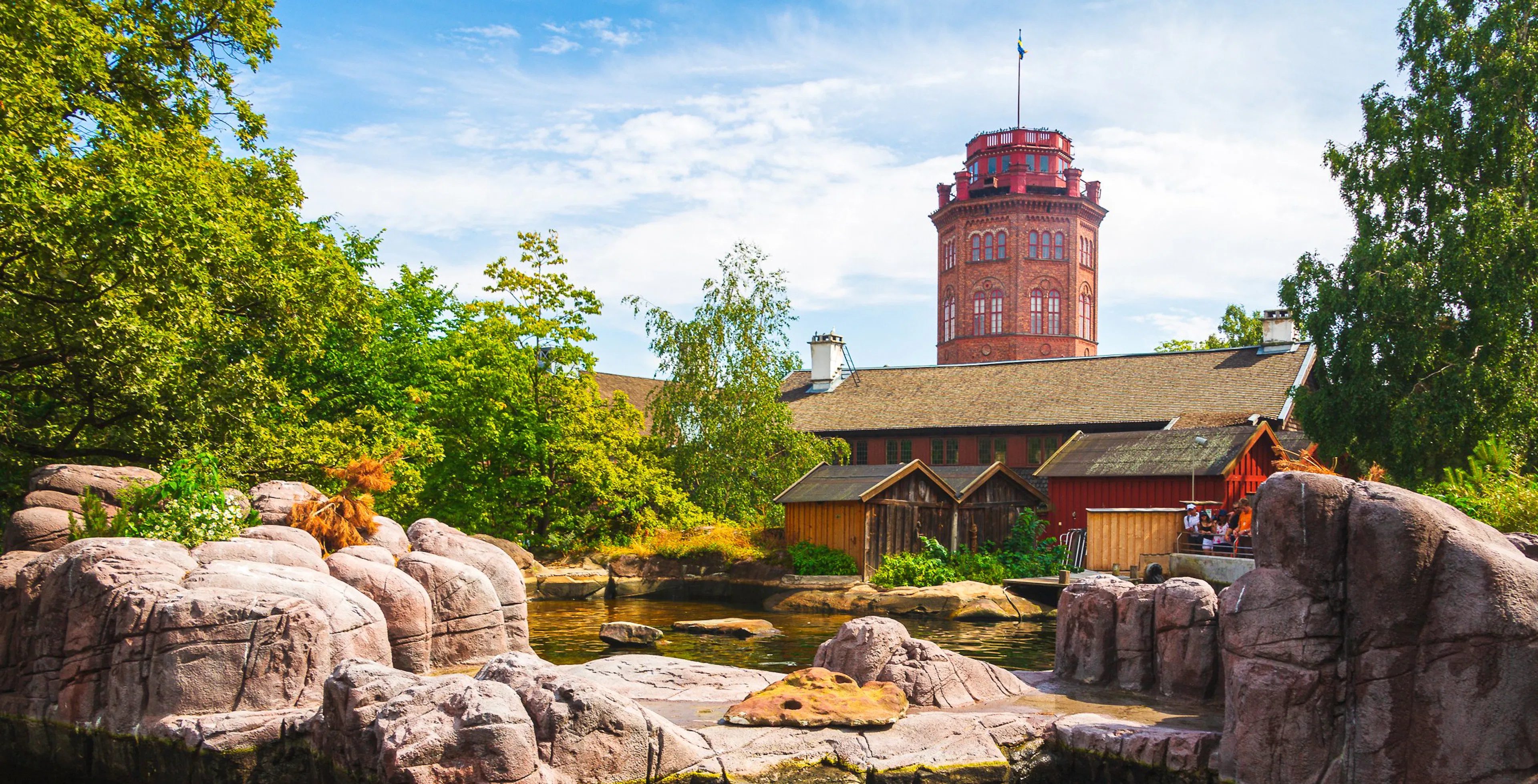 Skansen Museum with historic buildings and stone formations in Stockholm.