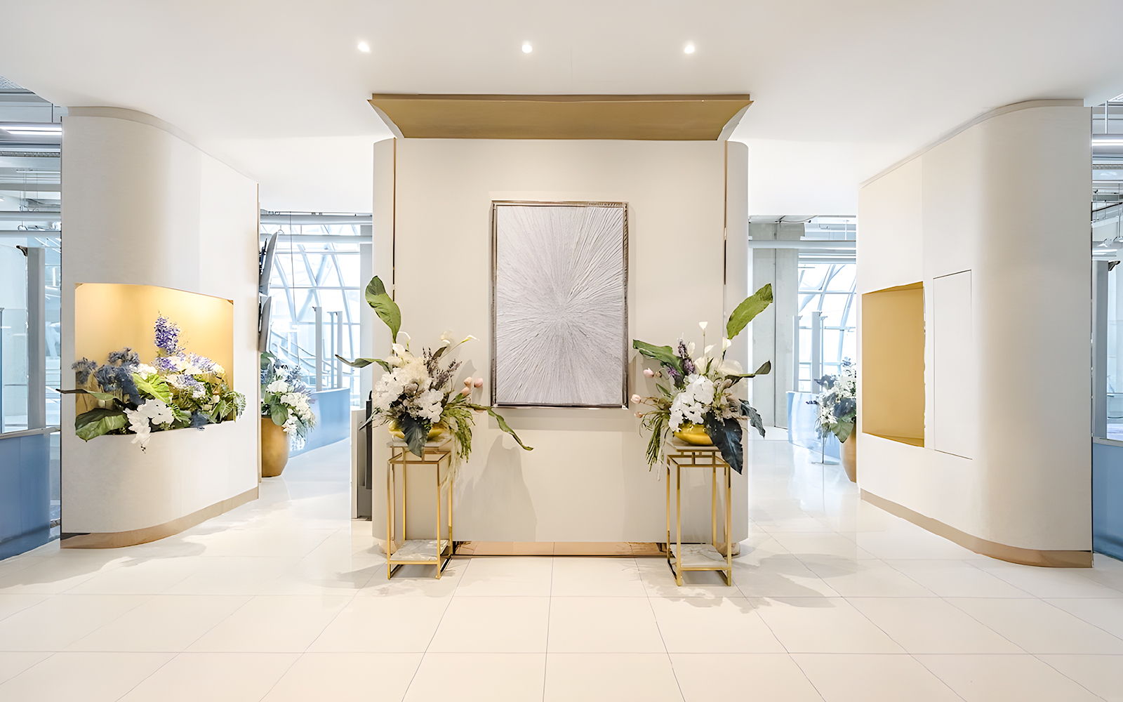 Miracle Lounge entrance with floral arrangements, Bangkok Airport, Thailand.