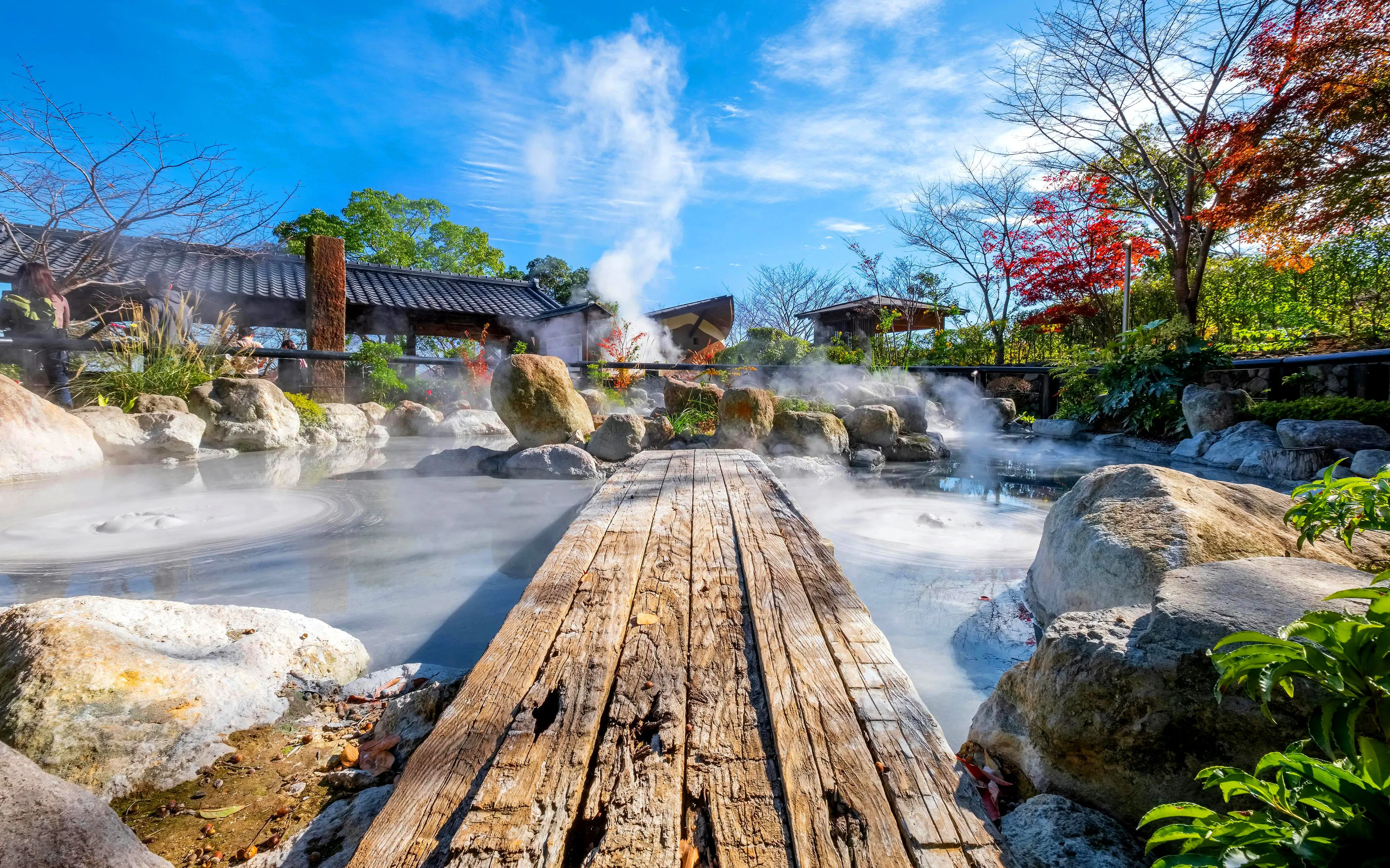 Oniishibozu Jigoku hot spring with steam rising, Beppu, Japan.