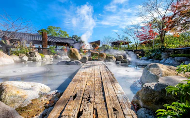 Oniishibozu Jigoku hot spring with steam rising, Beppu, Japan.