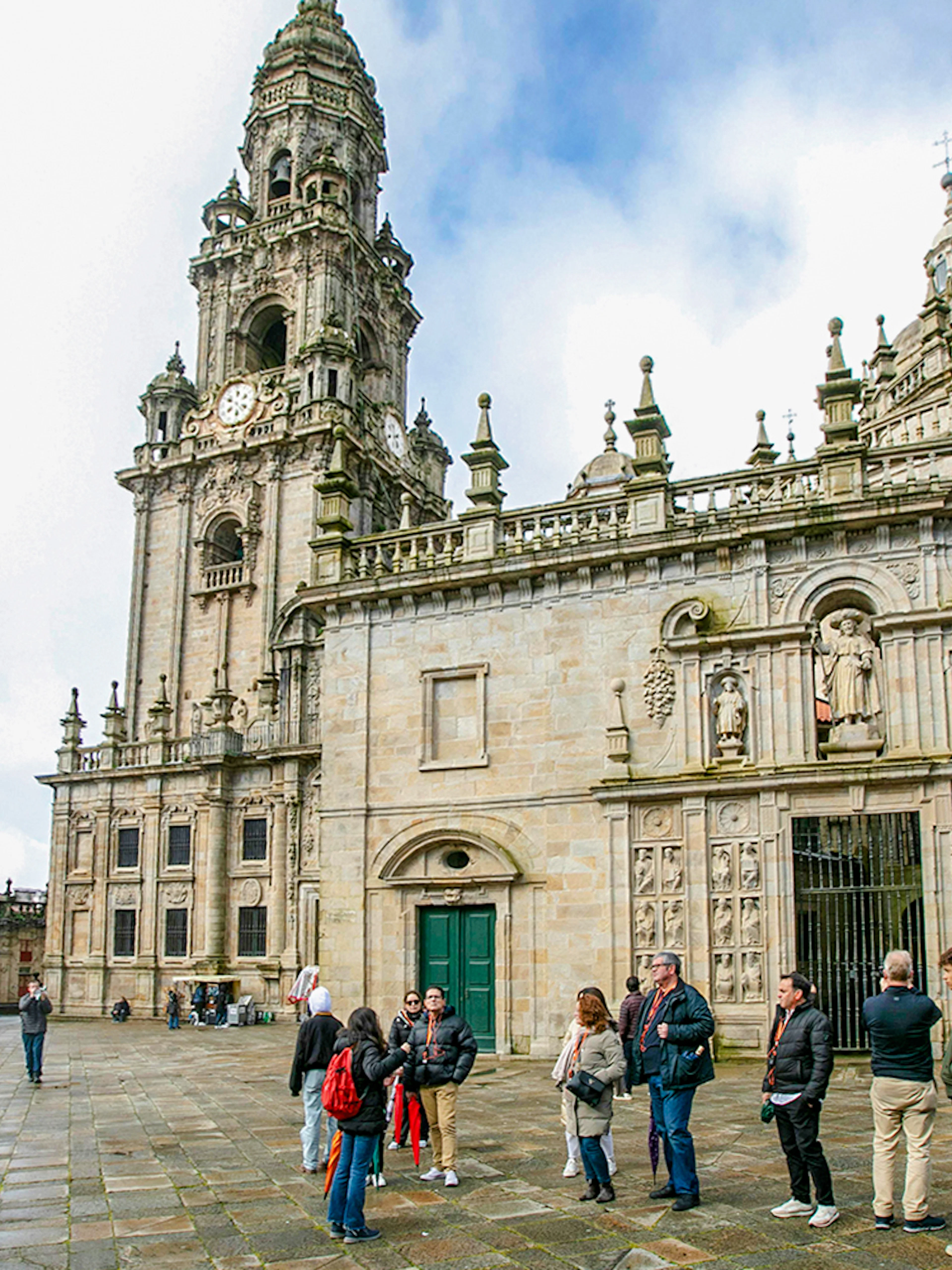 Guided group outside Santiago de Compostela Cathedral, Spain.