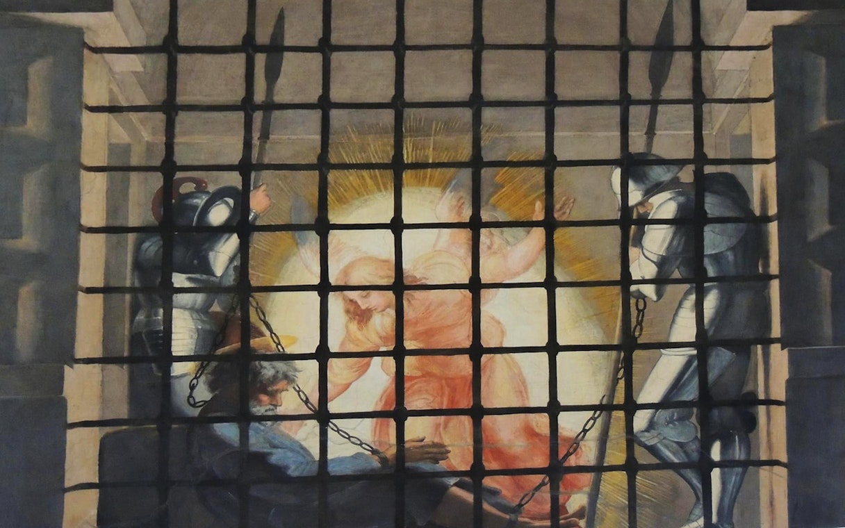 Angel appearing to chained prisoner in Vatican Museums fresco.