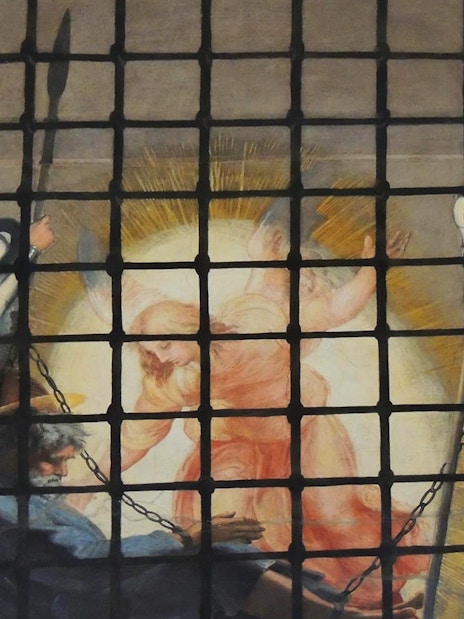 Angel appearing to chained prisoner in Vatican Museums fresco.