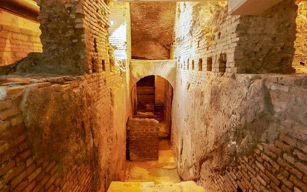 Underground ancient Roman brick passageway in Rome.