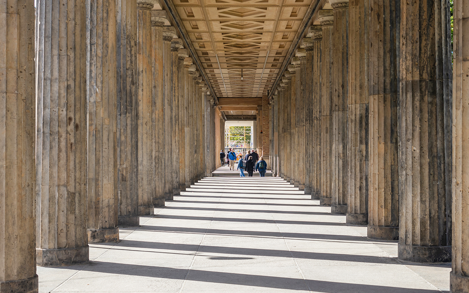 Altes Museum columns with sunlight streaming through, Museum Island, Berlin, Germany.