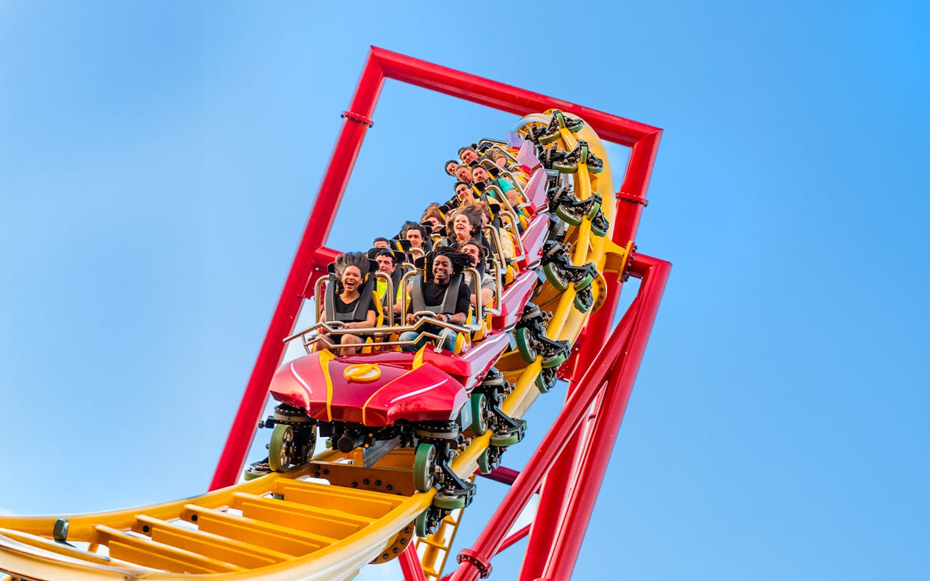 Riders on THE FLASH™ Vertical Velocity roller coaster at Six Flags Great Adventure.